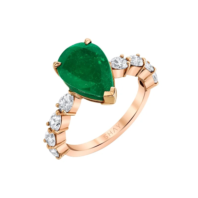 Pear Shaped Emerald Ring with Pear Diamond Band